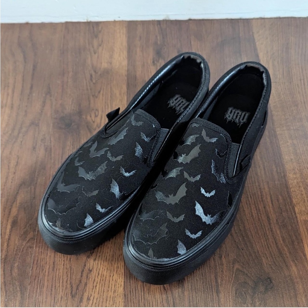 YRU Black slip-on shoes; Black bat pattern size 9